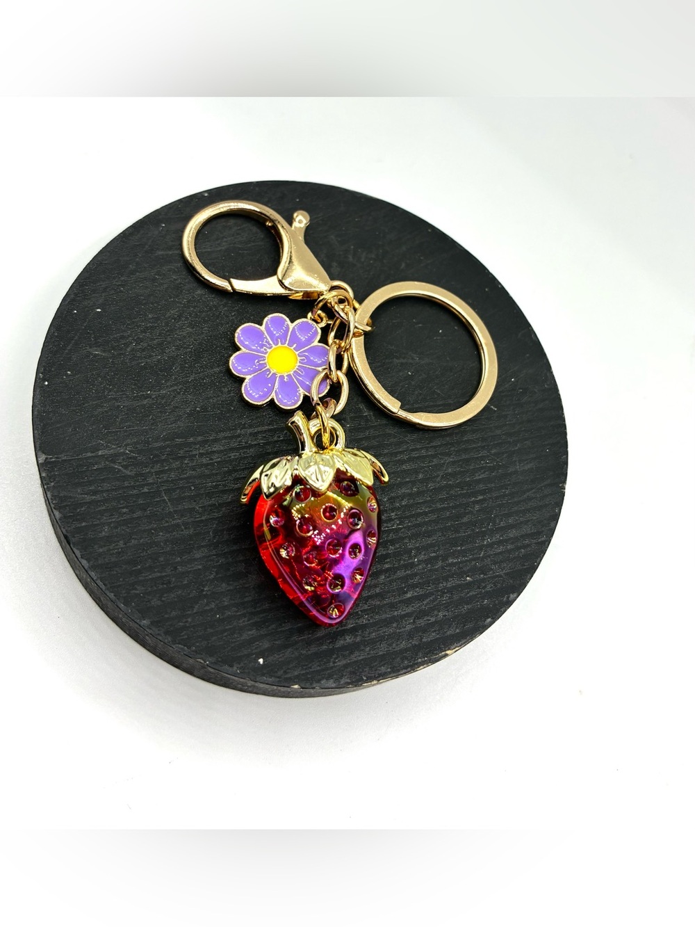 Gold-Tone Strawberry Keychain with Purple Flower Charm